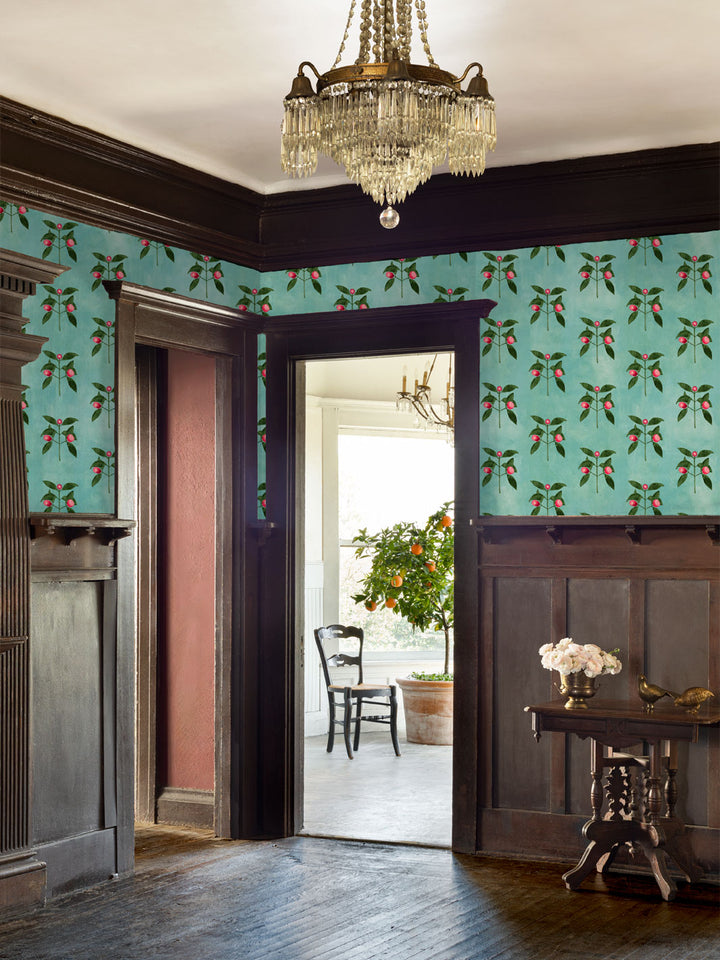 Wallpaper border in aqua blue with raspberry vine pattern across interior wall