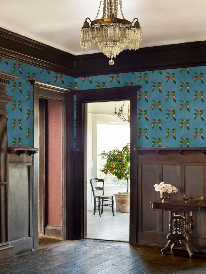 Raspberry flower vine wallpaper on walls, teal background with pink blossoms and green leaves