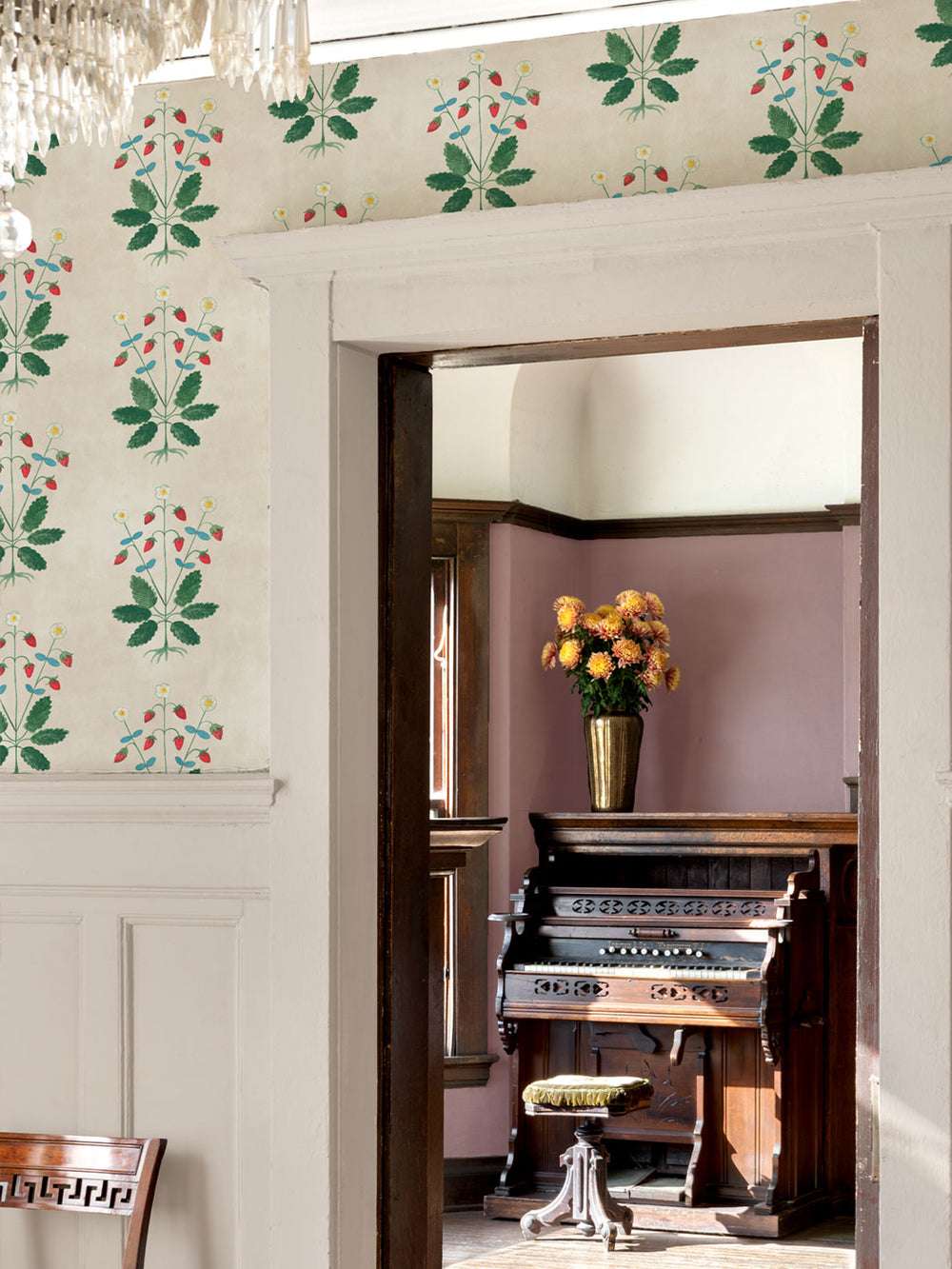 Botanical strawberry wallpaper panel with green leaves and small flowers