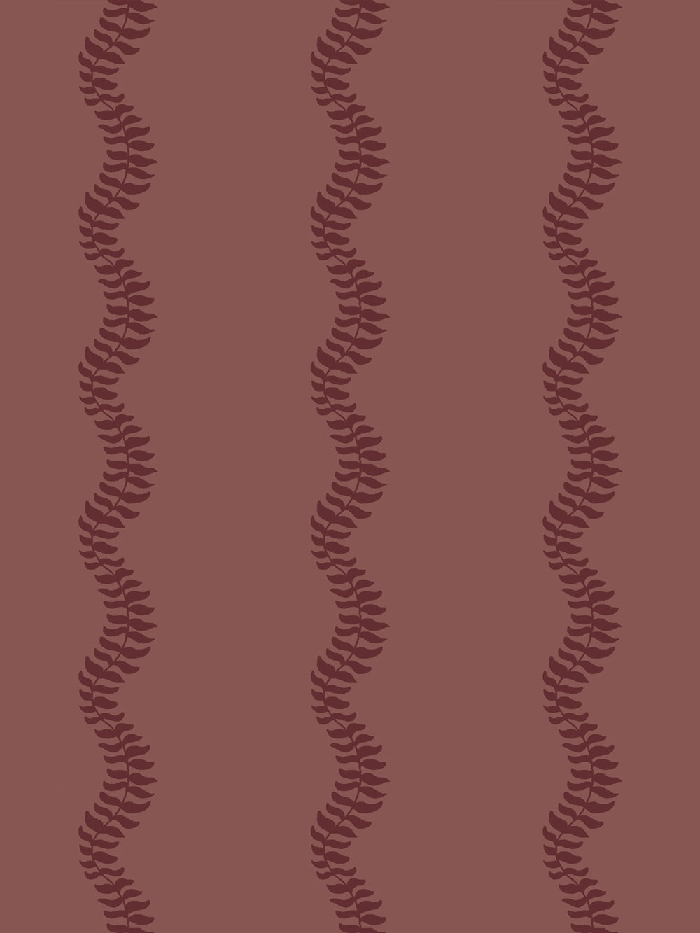 Close crop of deep wine burgundy leaf stripes on muted brick rose-brown like faded
