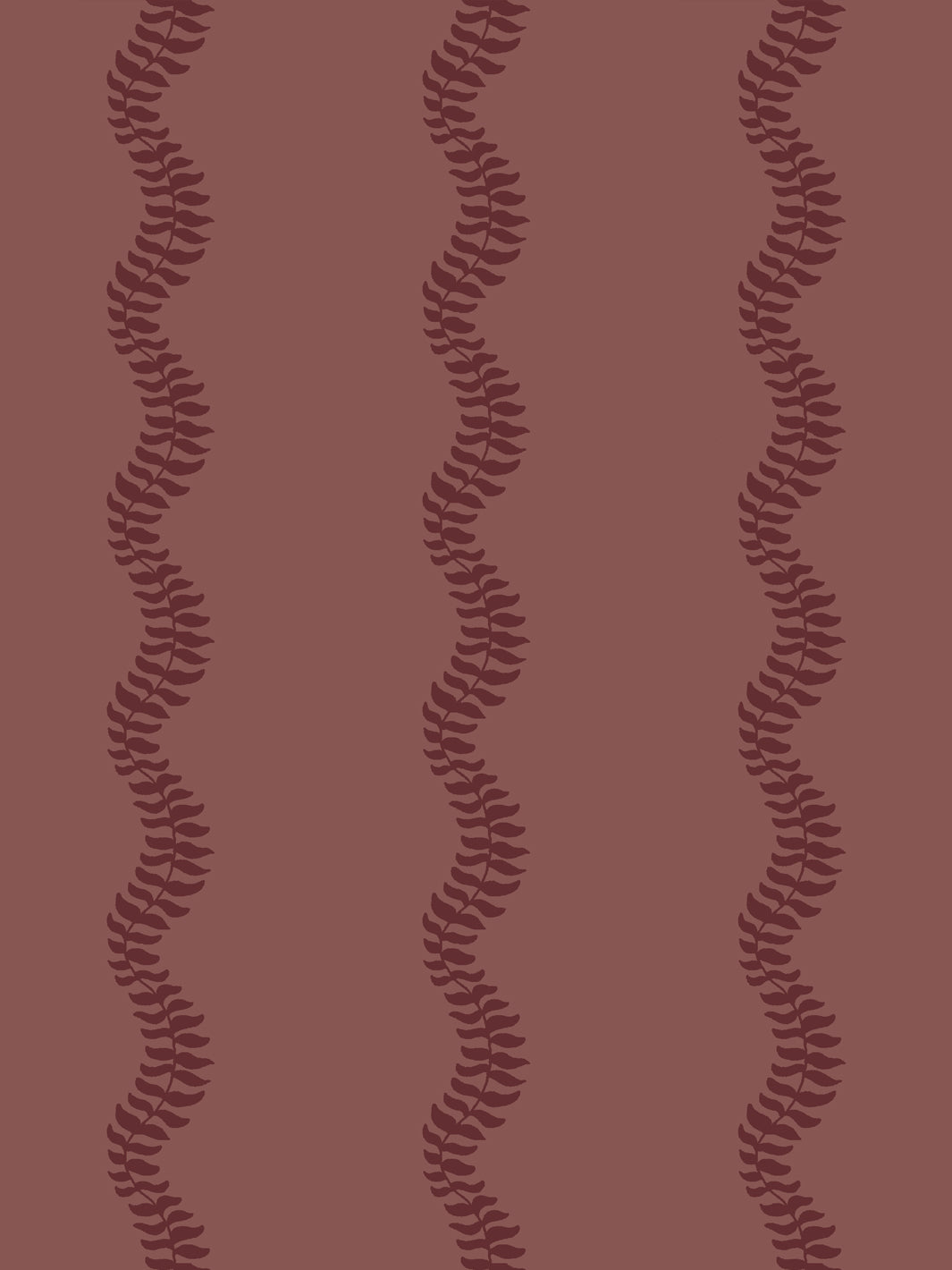 Close crop of deep wine burgundy leaf stripes on muted brick rose-brown like faded