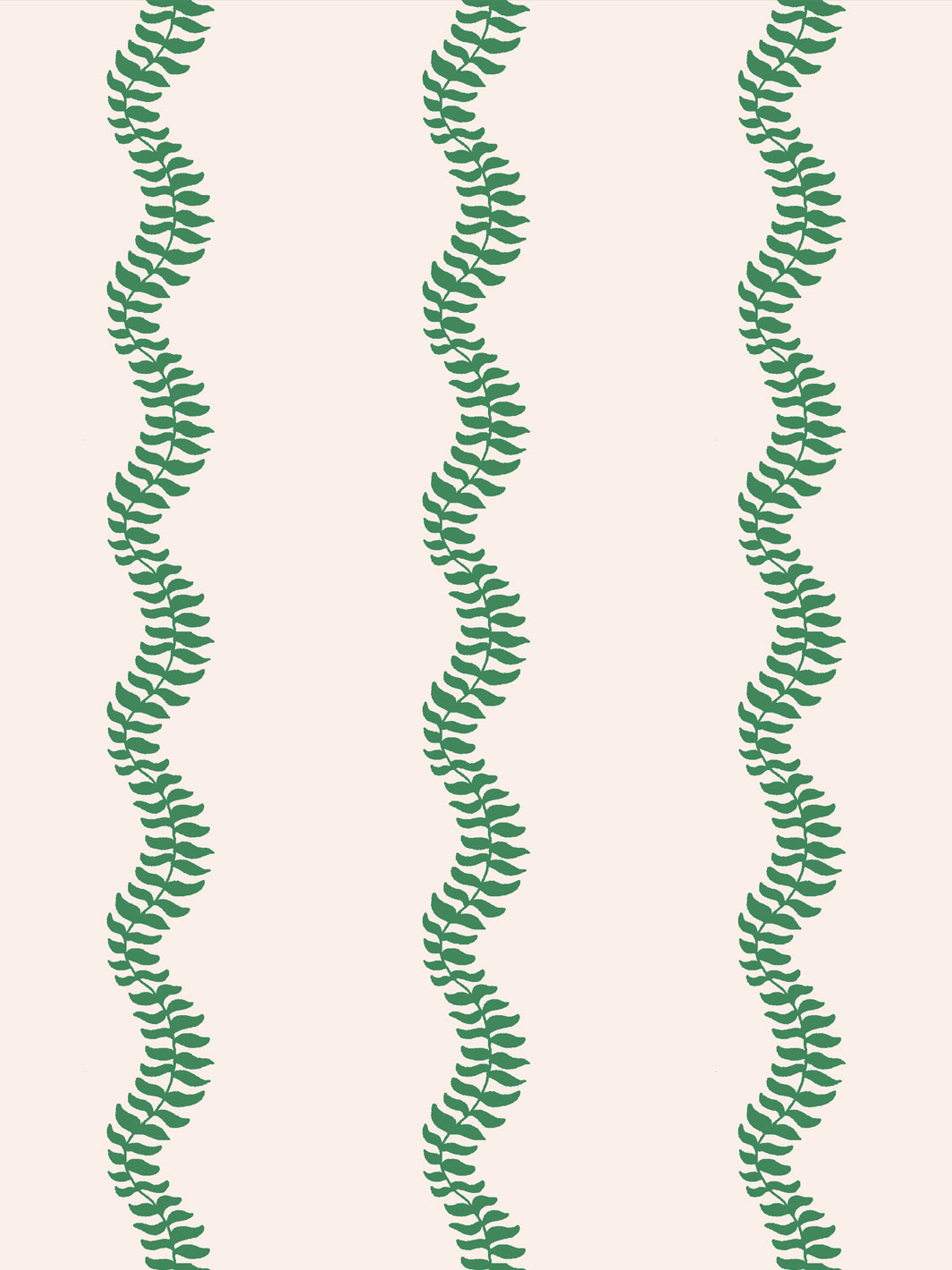 Close crop of bright kelly emerald green leaf stripes on warm cream