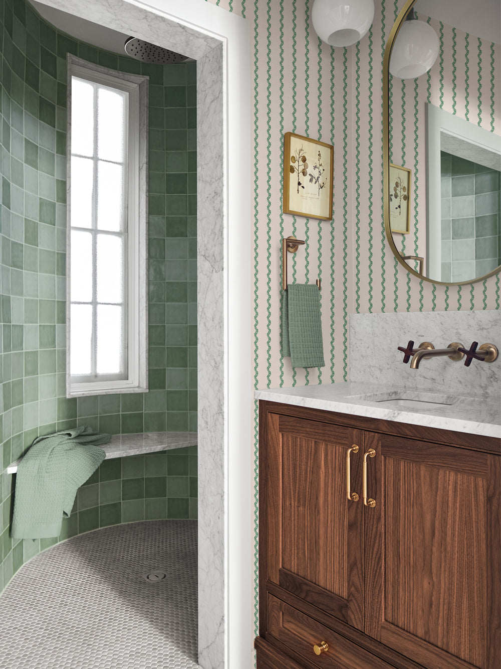 Green and cream stripe wallpaper in a bath with walnut vanity, brass mirror and marble counter