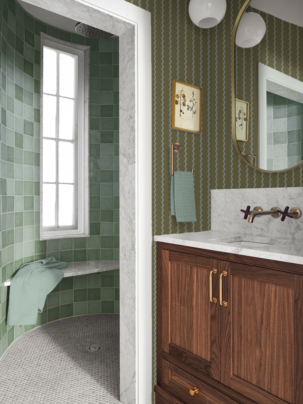Olive and blue stripe wallpaper in a bathroom with green tile shower and walnut vanity