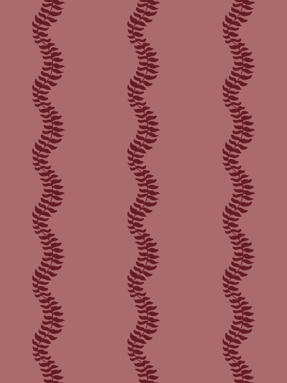 Close crop of deep garnet wine red leaf stripes on dusty rose pink