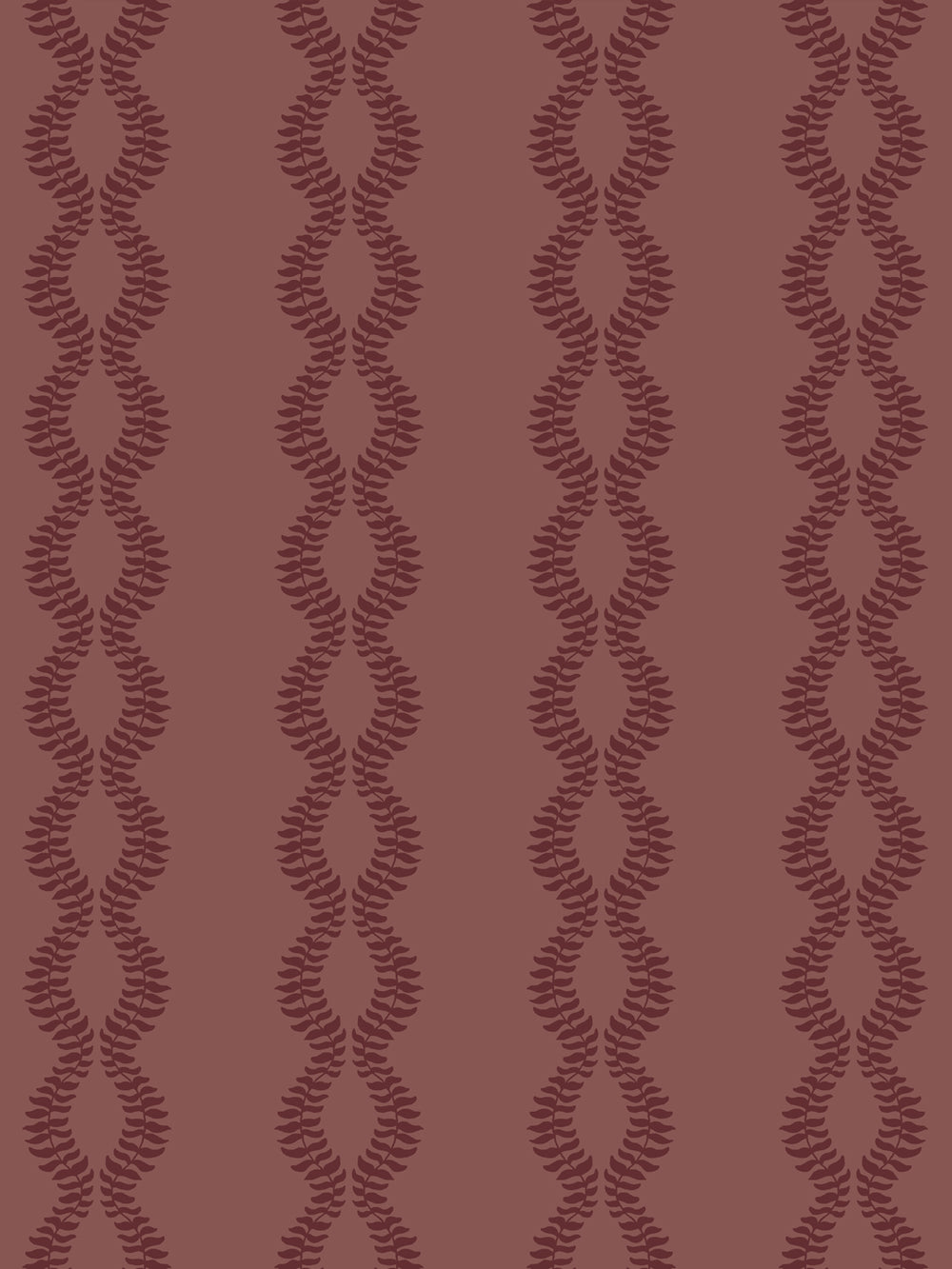 Close crop of dark maroon leaf vines on muted brick red