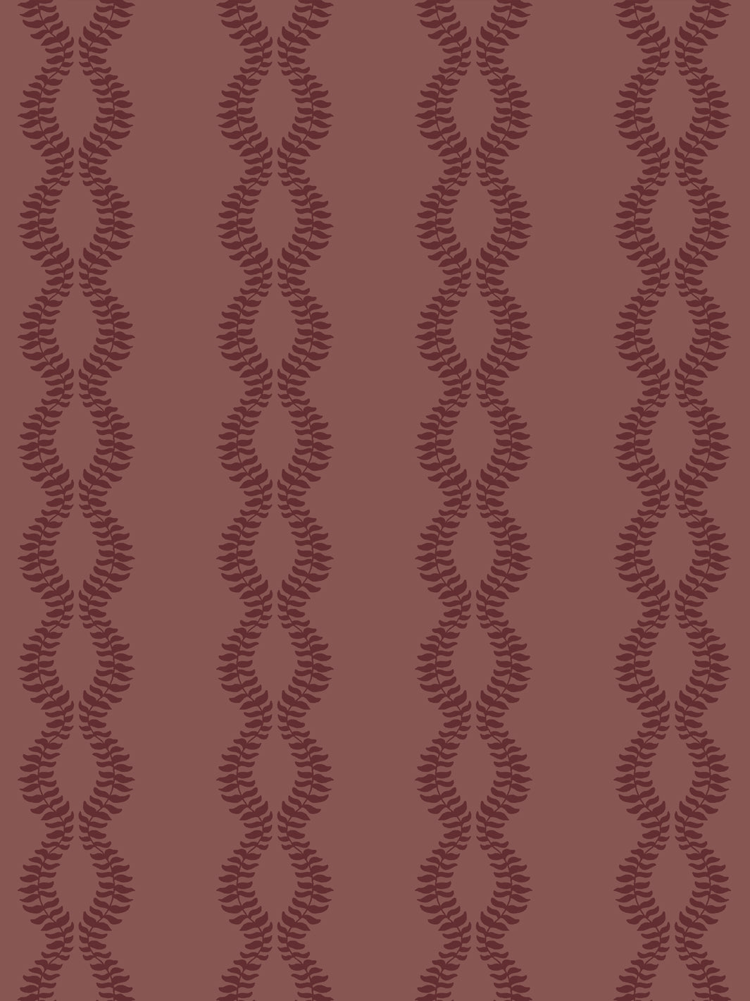 Close crop of dark maroon leaf vines on muted brick red