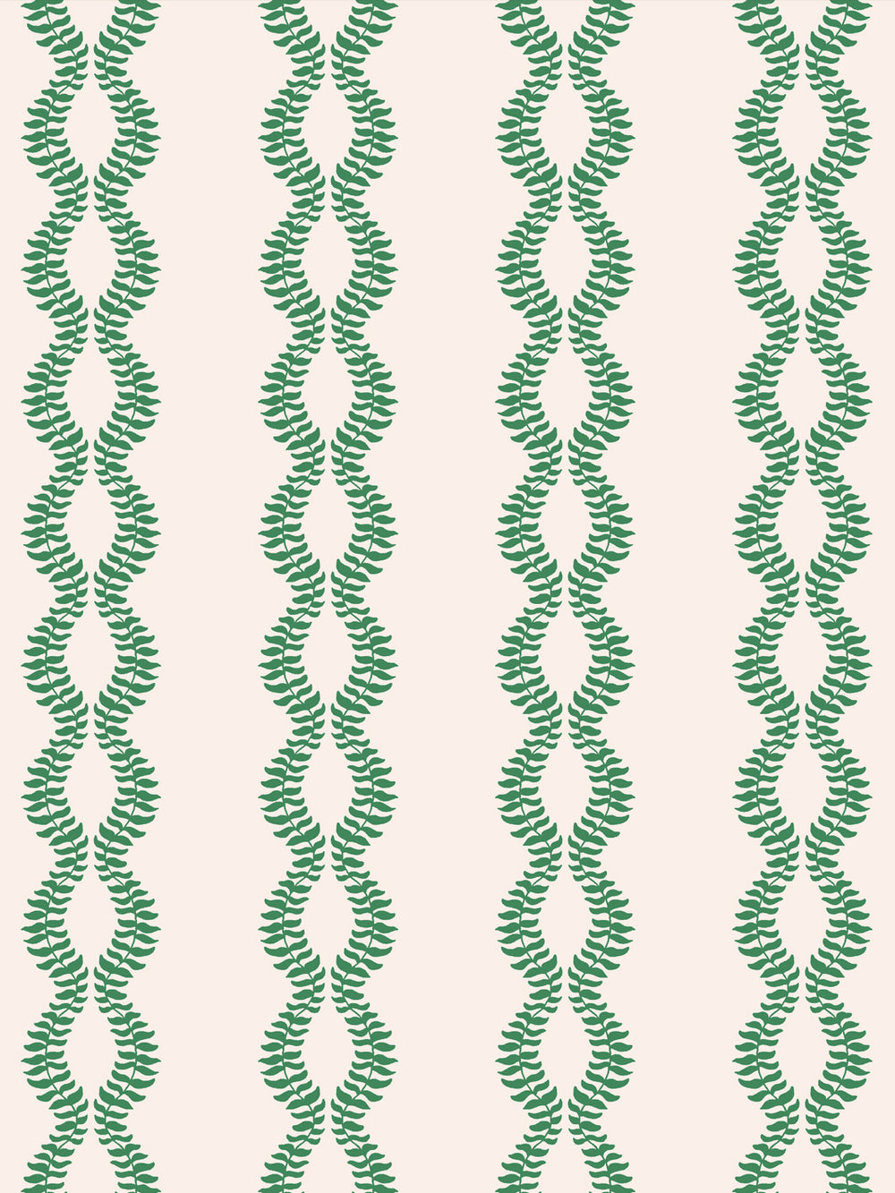 Close crop of saturated kelly or emerald green leaf vines on warm blush-cream off-white