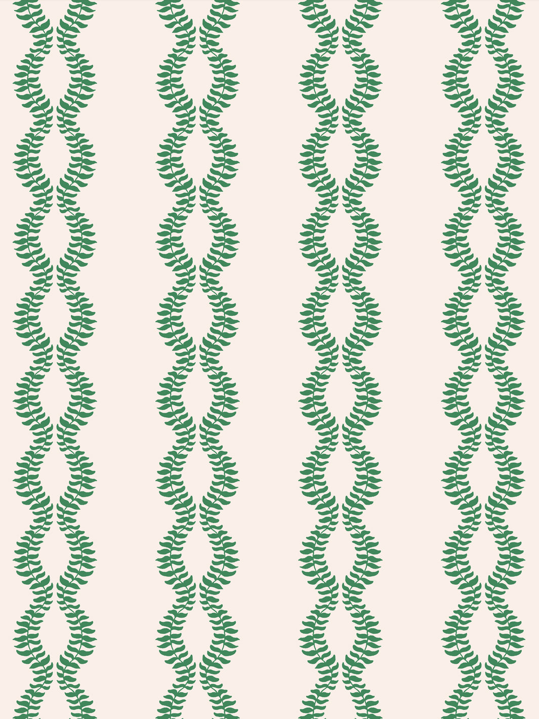 Close crop of saturated kelly or emerald green leaf vines on warm blush-cream off-white