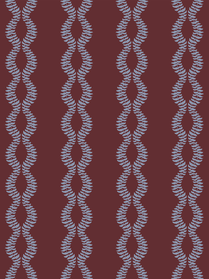 Close crop of dusty periwinkle blue-grey leaf vines on deep merlot