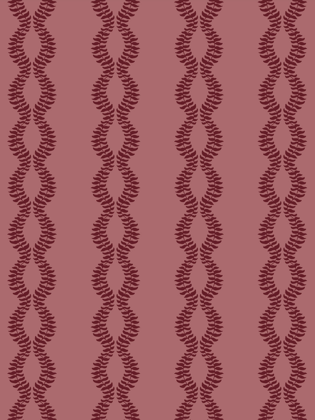 Close crop of deep garnet burgundy leaf vines on dusty rose