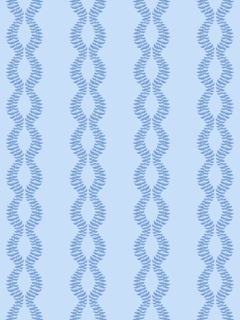 Close crop of medium cornflower or denim blue leaf vines on pale sky blue
