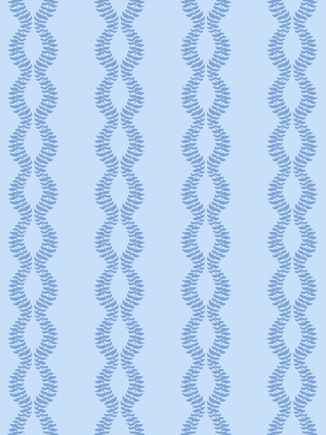 Close crop of medium cornflower or denim blue leaf vines on pale sky blue