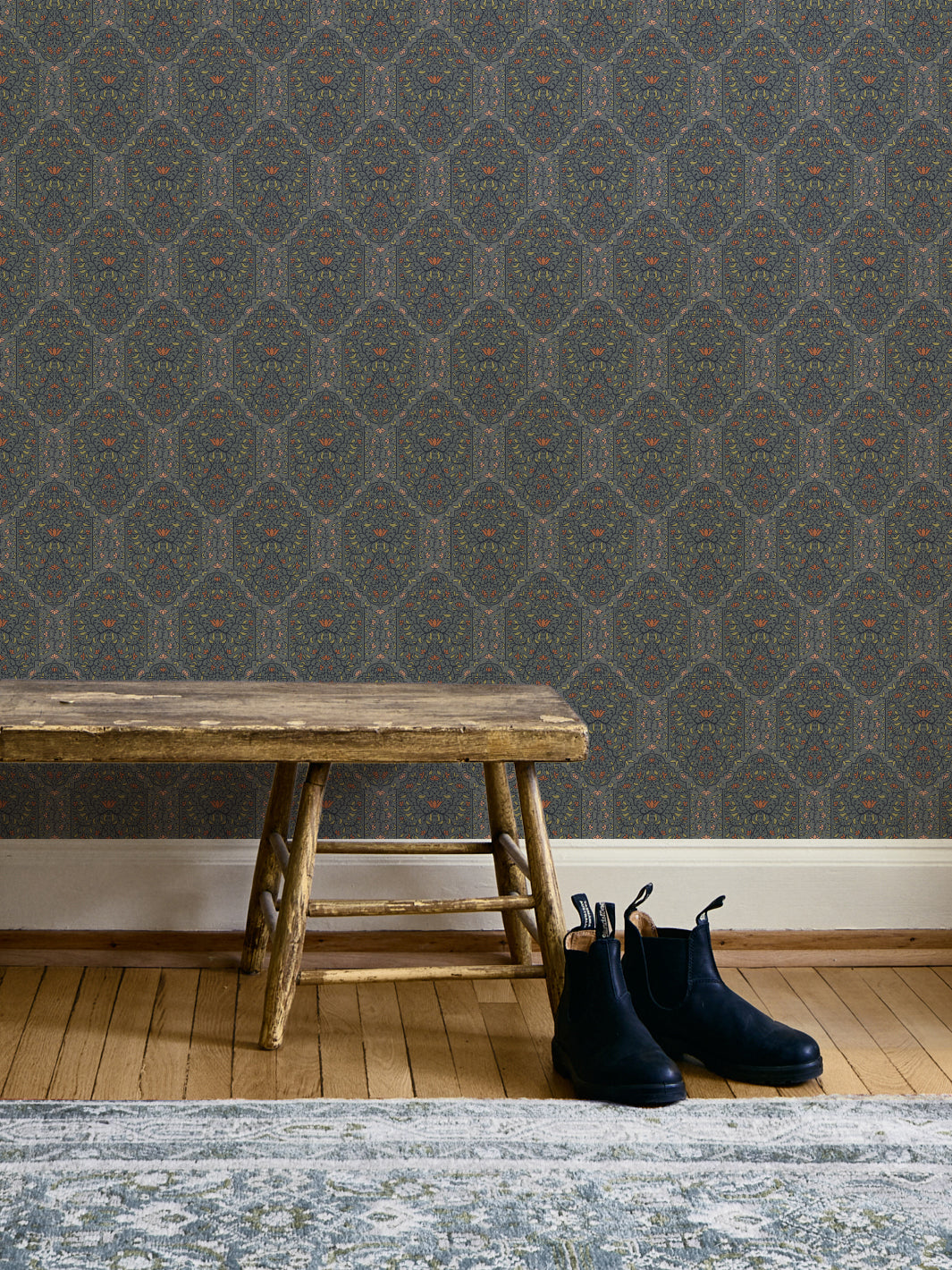 Entryway with Antique Navy Blossom Taliah Large wallpaper, rustic wood bench and black boots