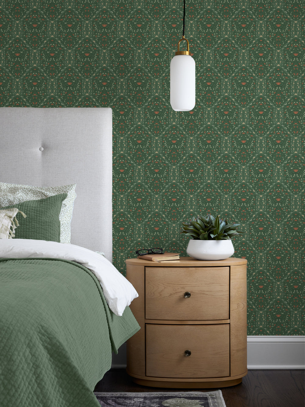 Bedroom with Buttercup Forest Taliah Large wallpaper, grey headboard, green quilt and oak nightstand