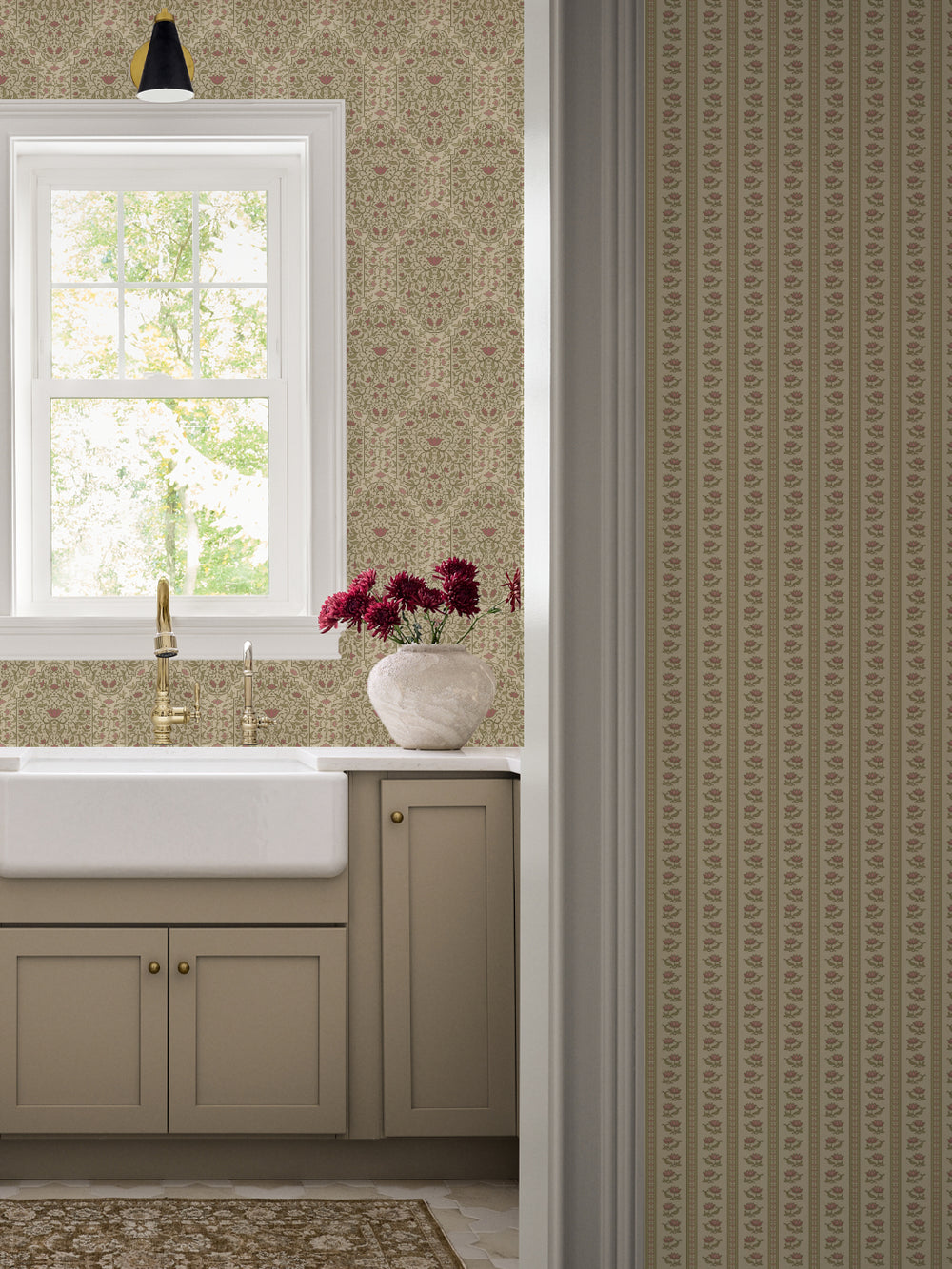 Kitchen with Country Manor Blush Taliah Large wallpaper, apron sink, brass faucet and taupe cabinets