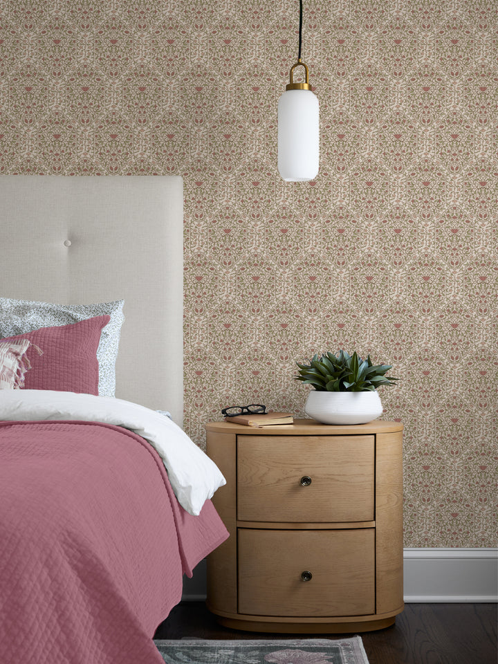 Bedroom with Honeysuckle Parchment Taliah Large wallpaper, cream headboard, rose quilt and oak nightstand