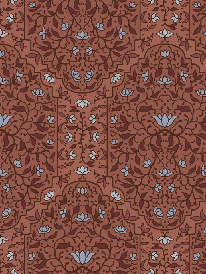 Close crop of deep oxblood brown and foliate arches on terracotta brick clay