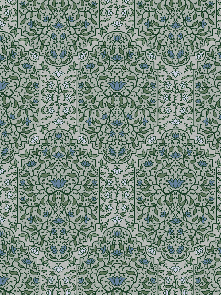 Close crop of medium-dark green and foliate arches on pale grey