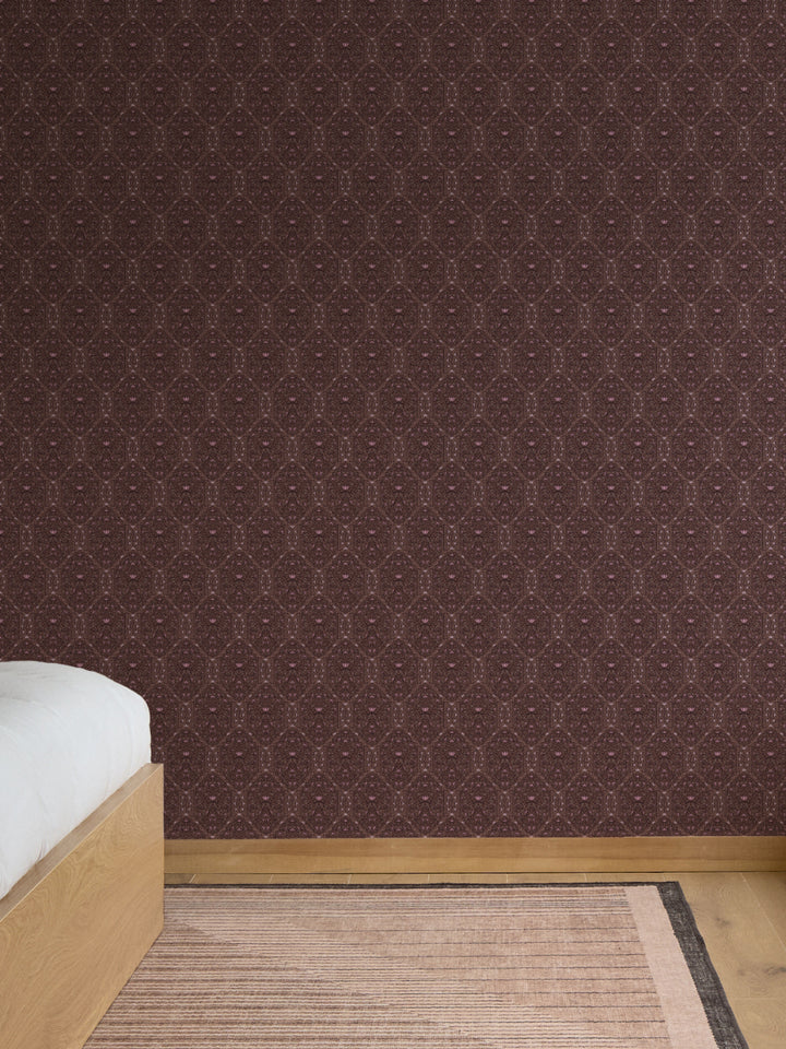 Plum-brown Taliah wallpaper in a bedroom with an oak platform bed and blush striped rug
