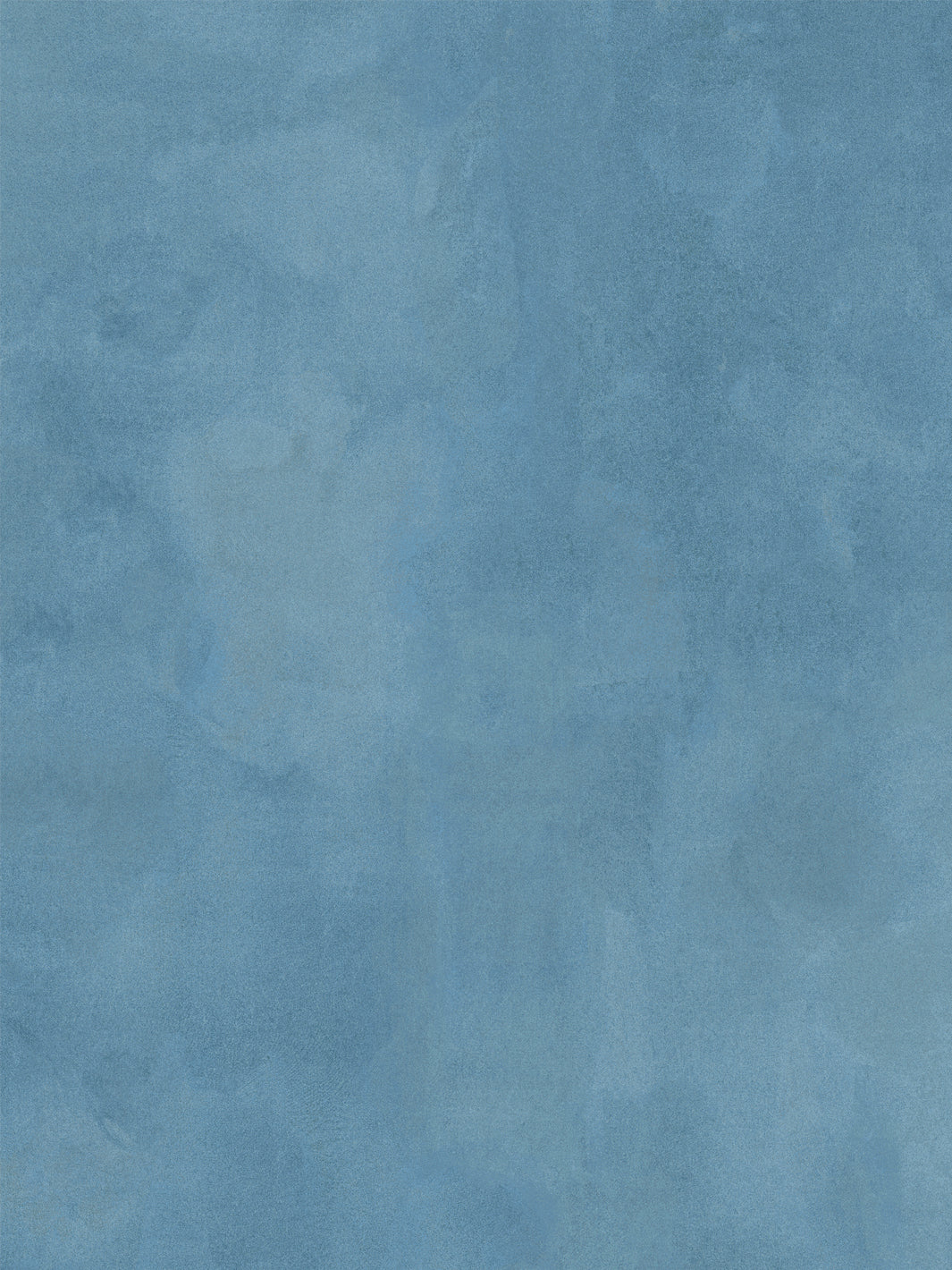 Cadet blue wash-pattern wallpaper close-up with mottled texture