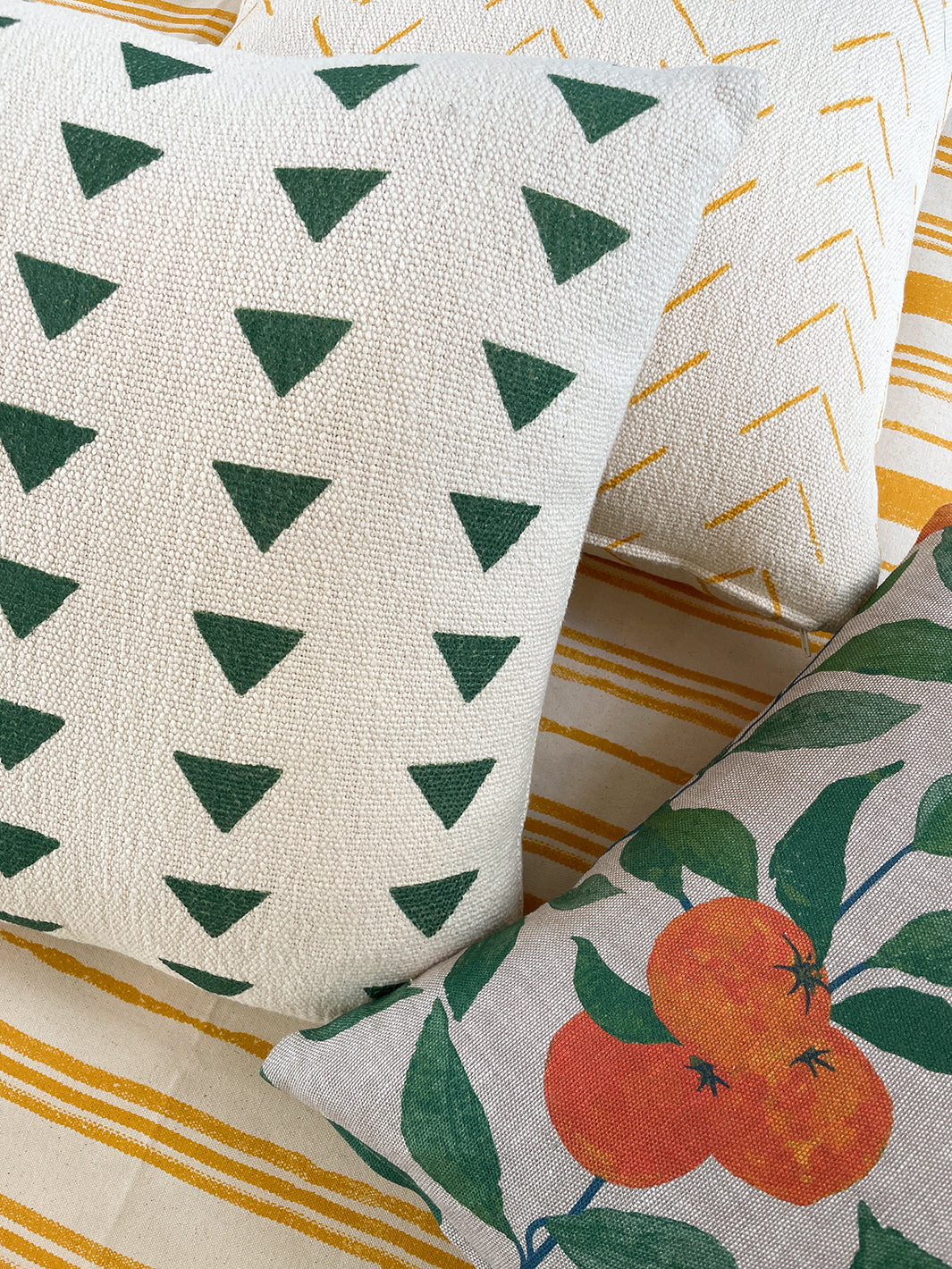 'Fabric by the Yard - Triangles - Green on California Cotton