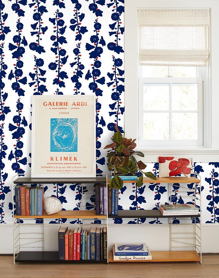 'Hollyhock' Wallpaper by Clare V. - Navy Red