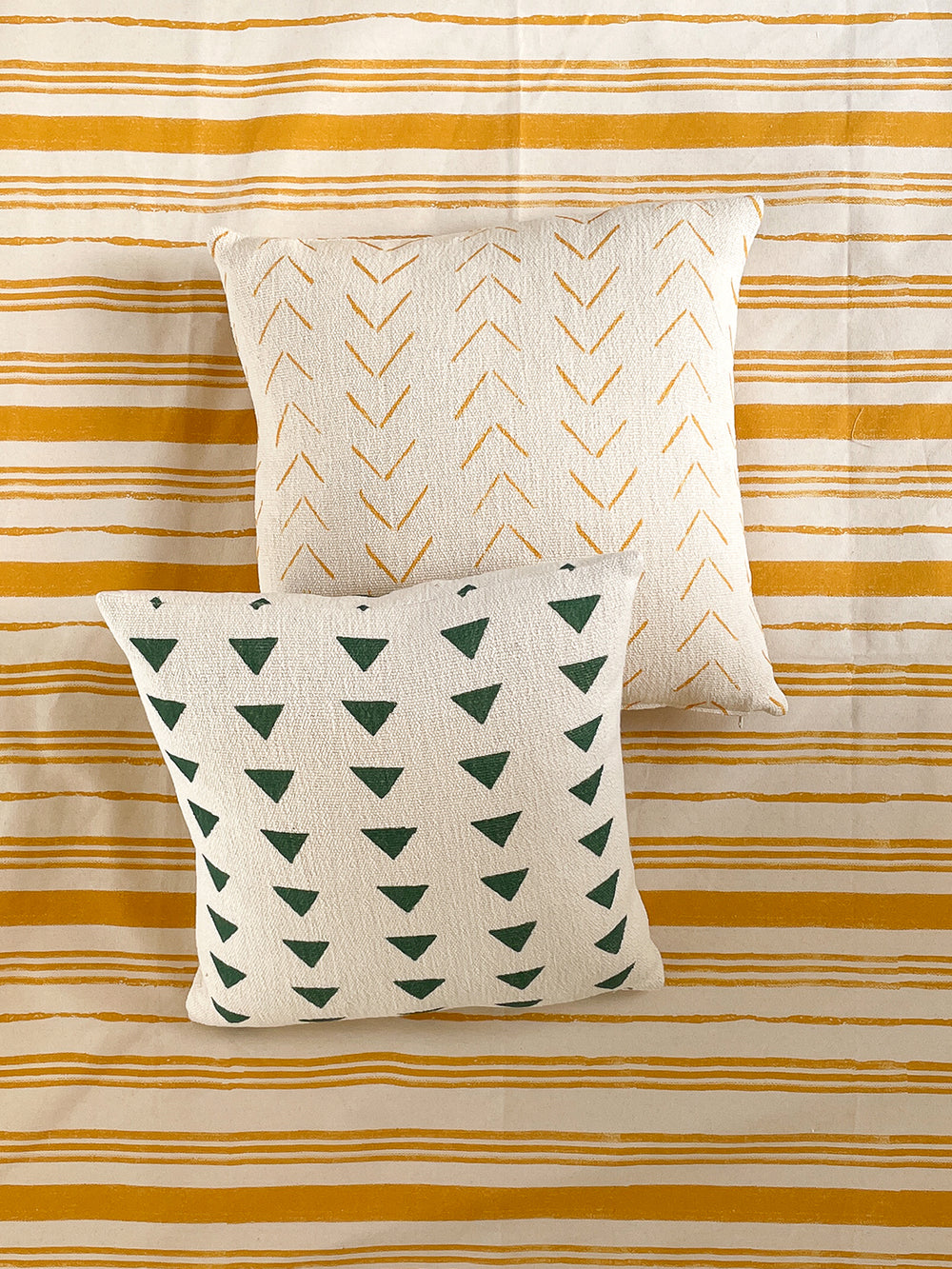 arrows throw pillow gold on california cotton