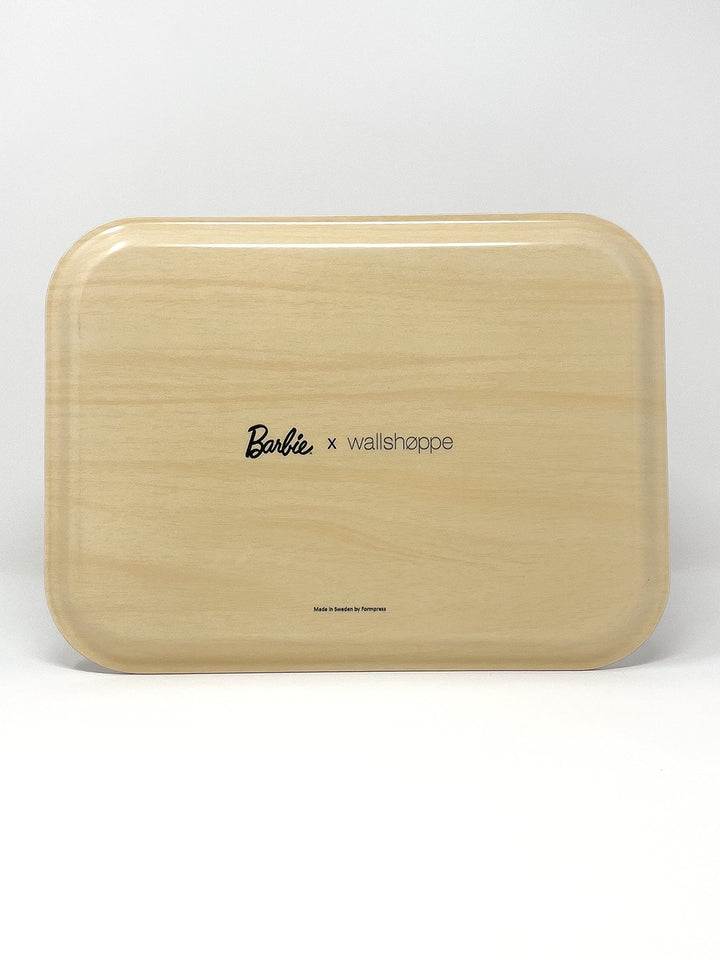 Cream tray underside with "Barbie x wallshoppe" logo text