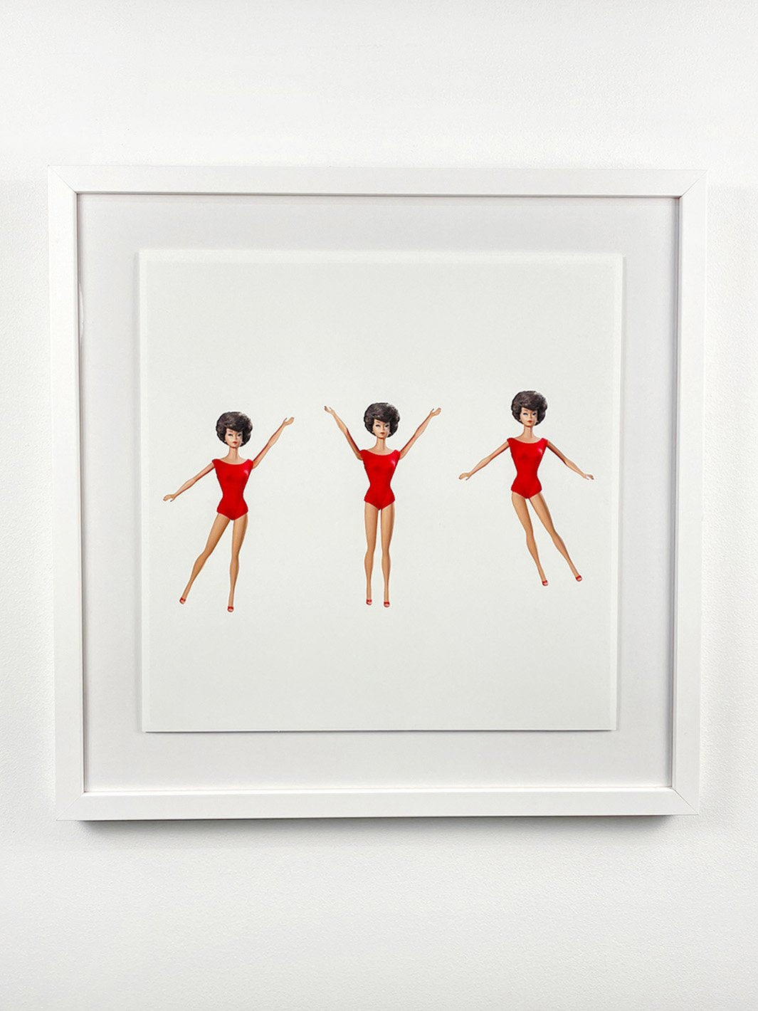 'Brunette Barbie™ in Motion Framed Art