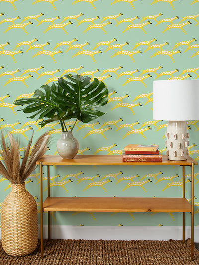 galloping giraffes wallpaper by tea collection aventurine