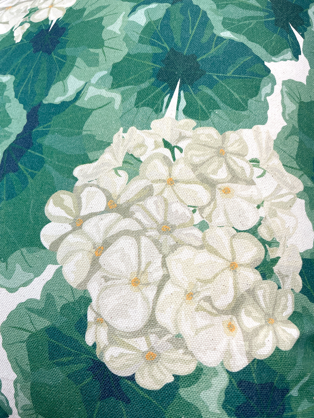 geranium throw pillow natural on raw canvas