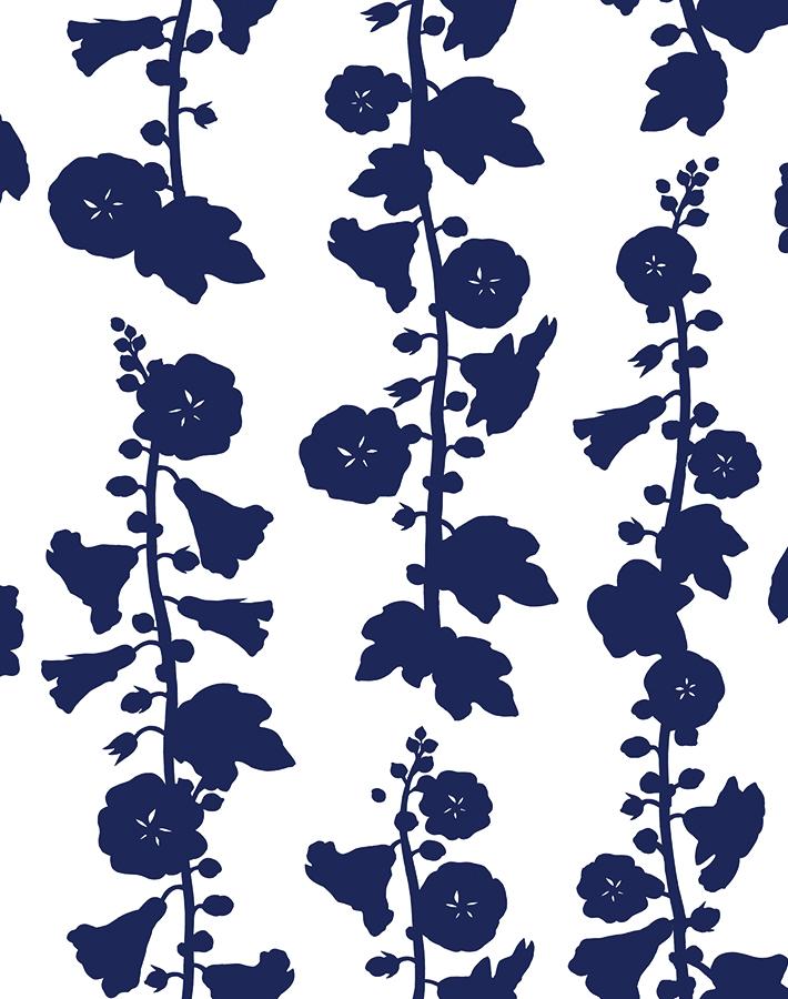 'Hollyhock' Wallpaper by Clare V. - Navy