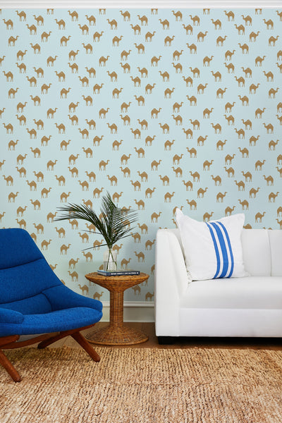 'Oasis Camels' Wallpaper by Tea Collection - Pale Blue