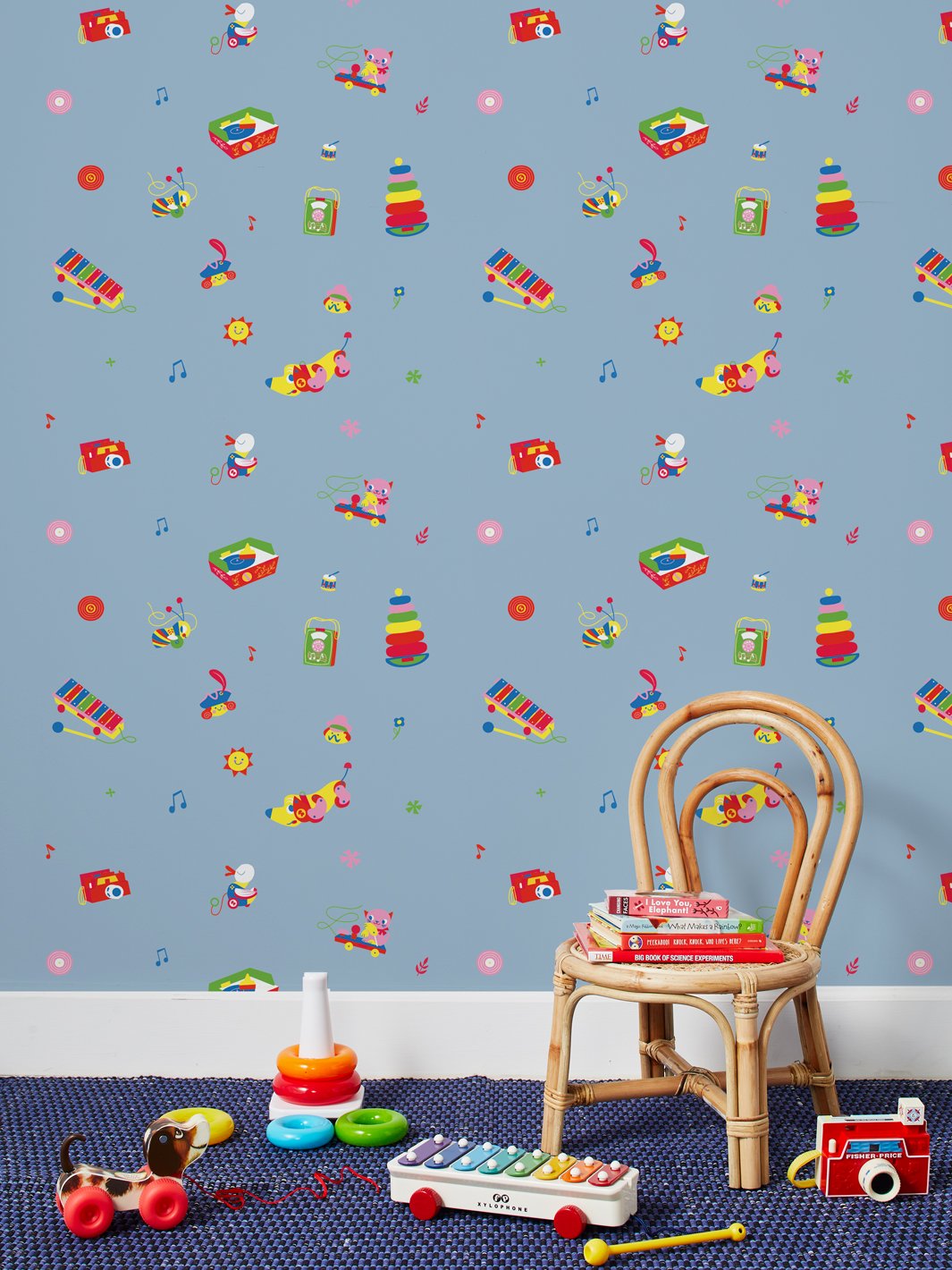 toy toss spaced wallpaper by fisher price denim