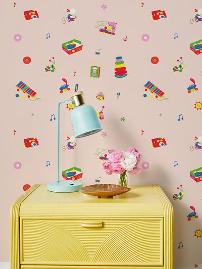 'Toy Toss Spaced' Wallpaper by Fisher-Price™ - Peach
