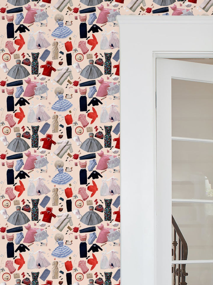 Peach wallpaper panel with repeating doll clothing and accessories icons