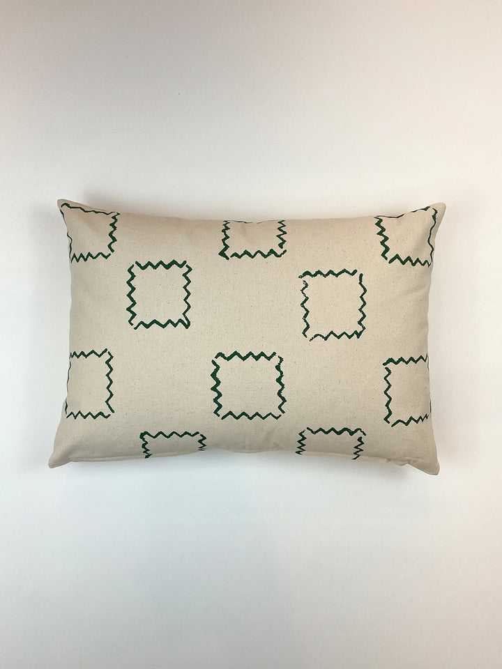 zag squares throw pillow green on raw canvas