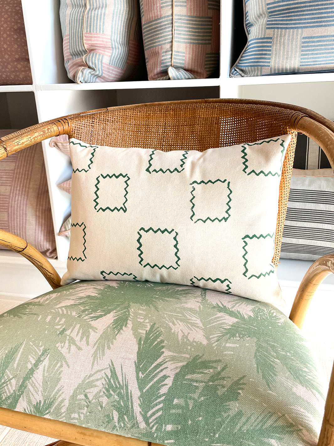 'Zag Squares' Lumbar Throw Pillow by Nathan Turner - Green on Raw Canvas