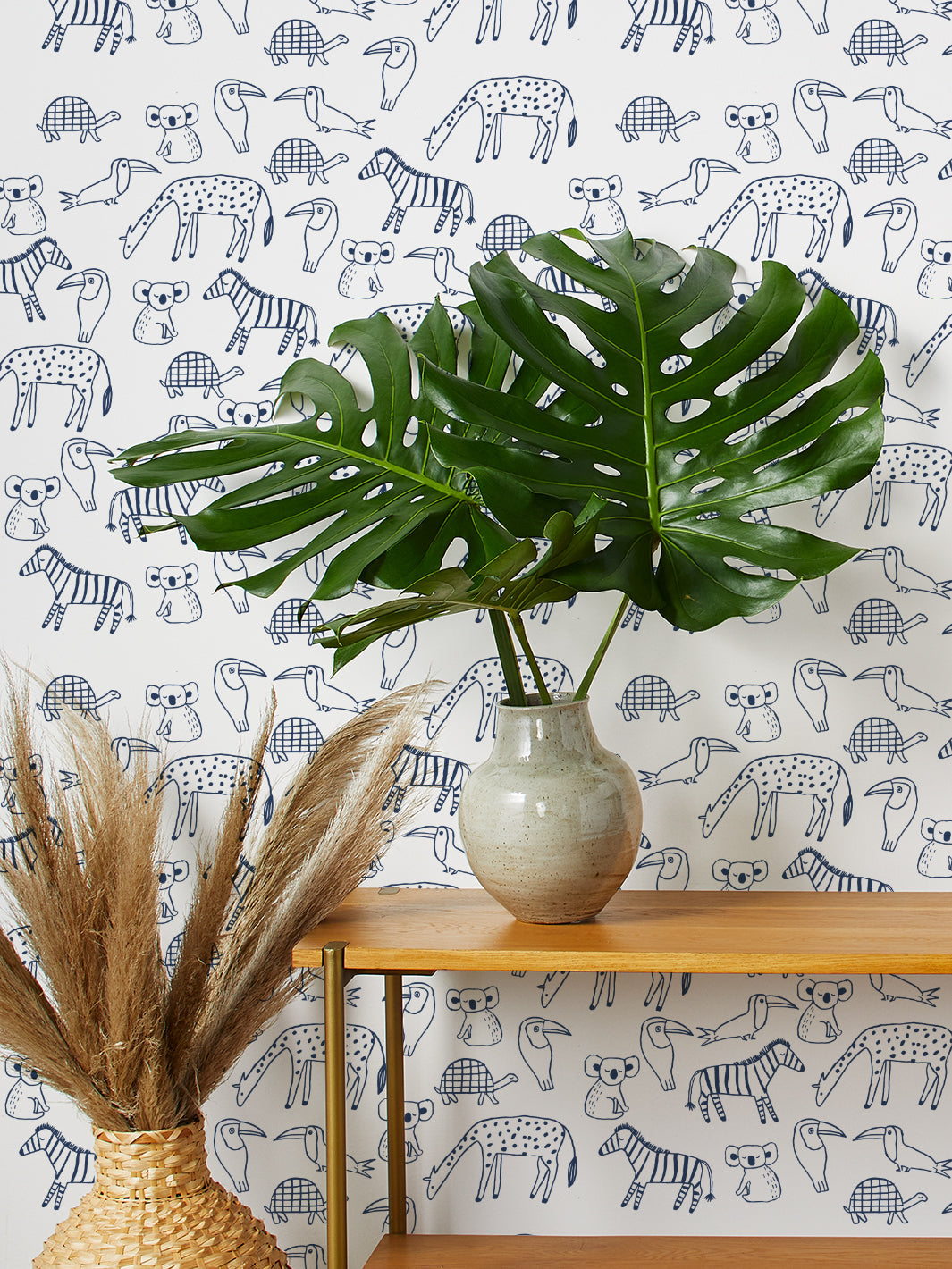 zoo party wallpaper by tea collection navy