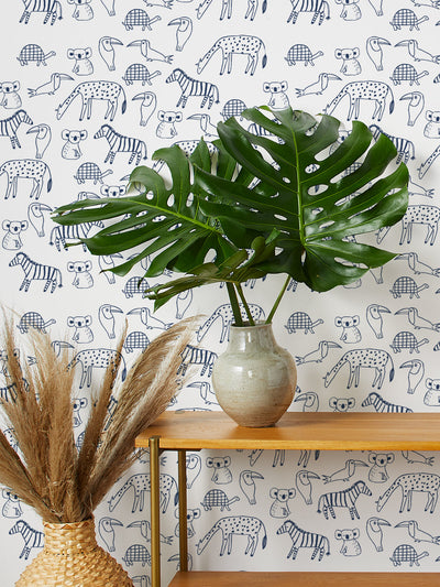 zoo party wallpaper by tea collection navy