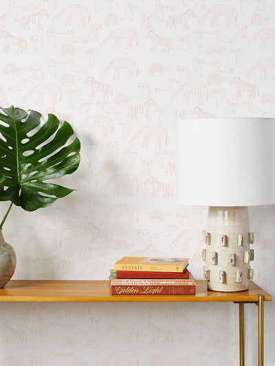 zoo party wallpaper by tea collection peach
